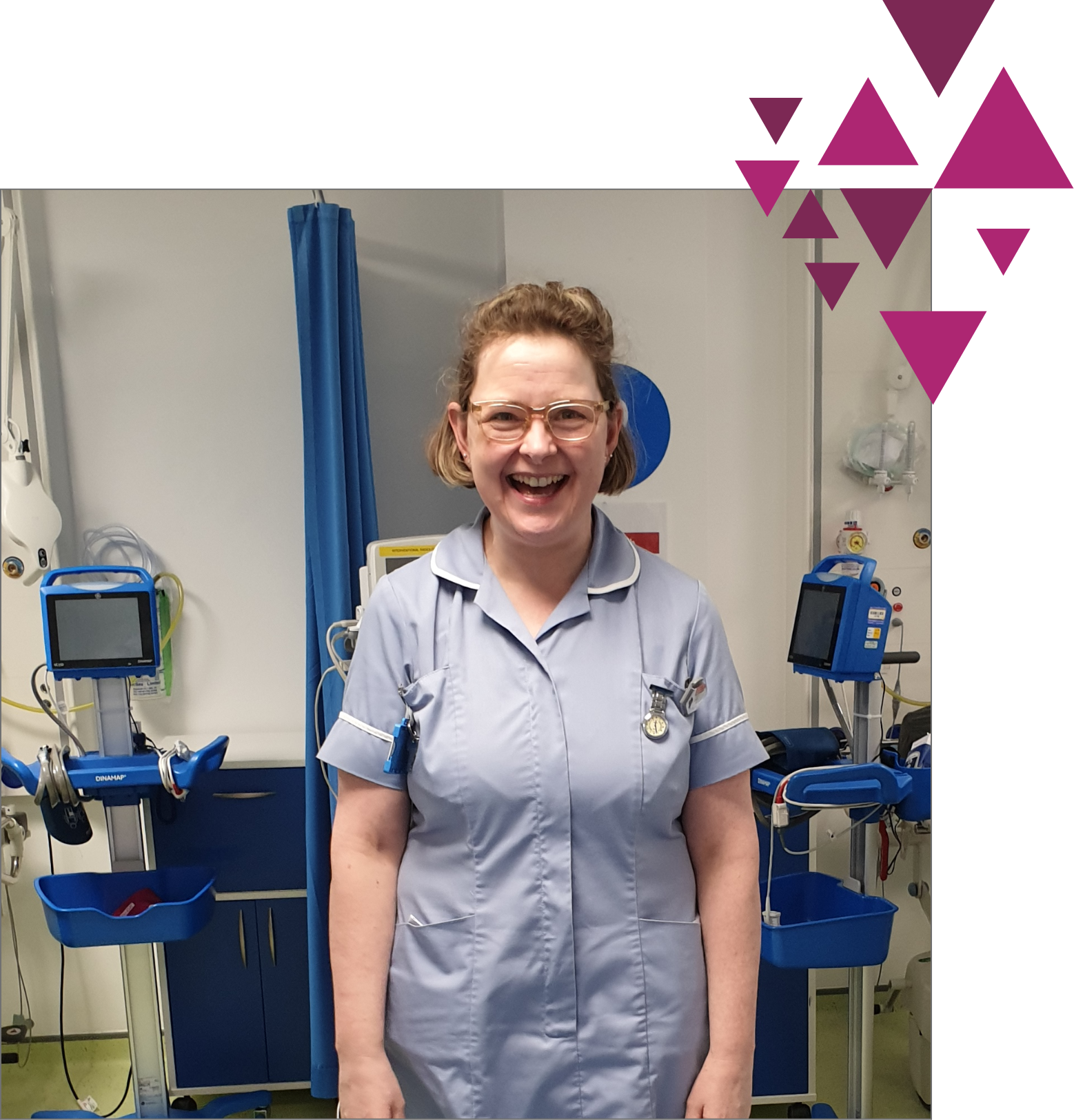 A smiling female nurse in a blue uniform standing in a hospital room with medical equipment in the background. bright pink geometric shapes appear at the top right.