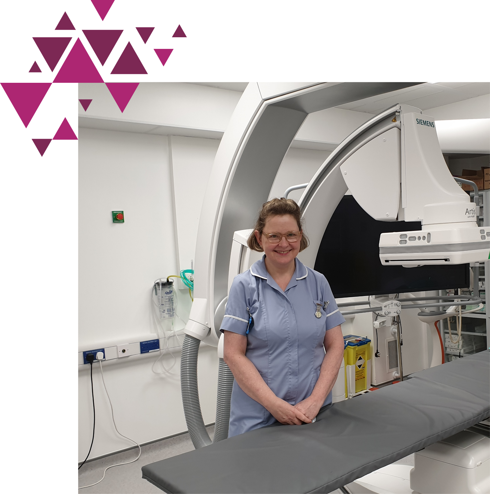A female healthcare professional in blue scrubs stands smiling in front of an advanced imaging machine in a clinical setting, with purple geometric shapes in the corner.